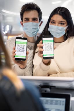 Phone displaying emergency health QR code