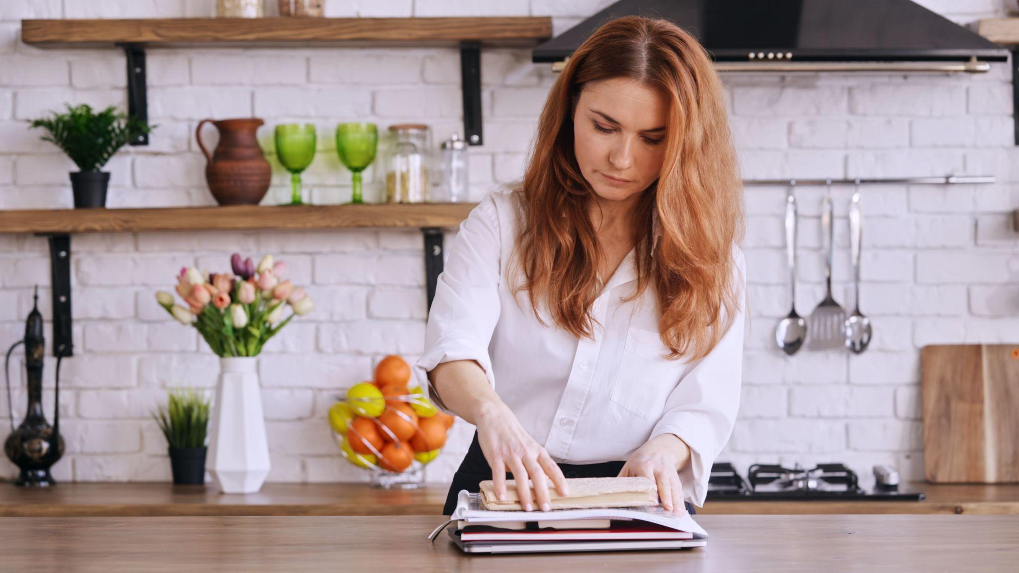Family member organizing important documents at home